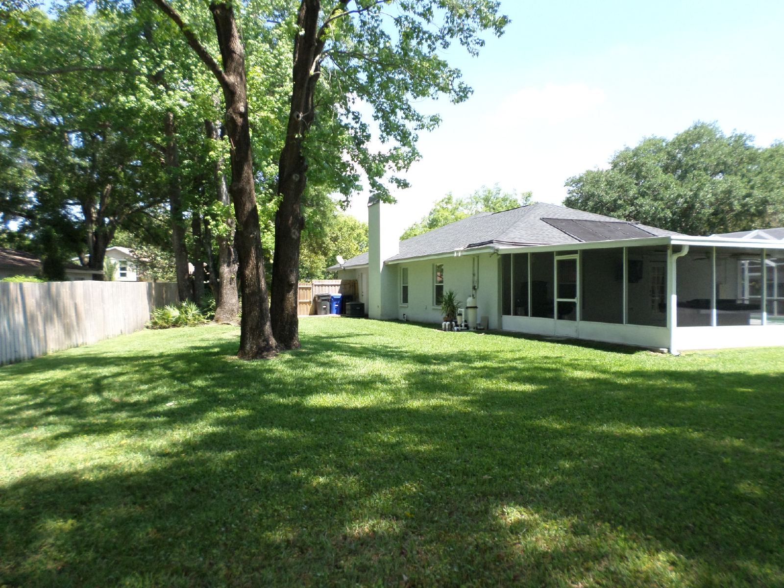 Gorgeous 4/2/2 Pool Home With Wood Floors On 1/2 Acre property image