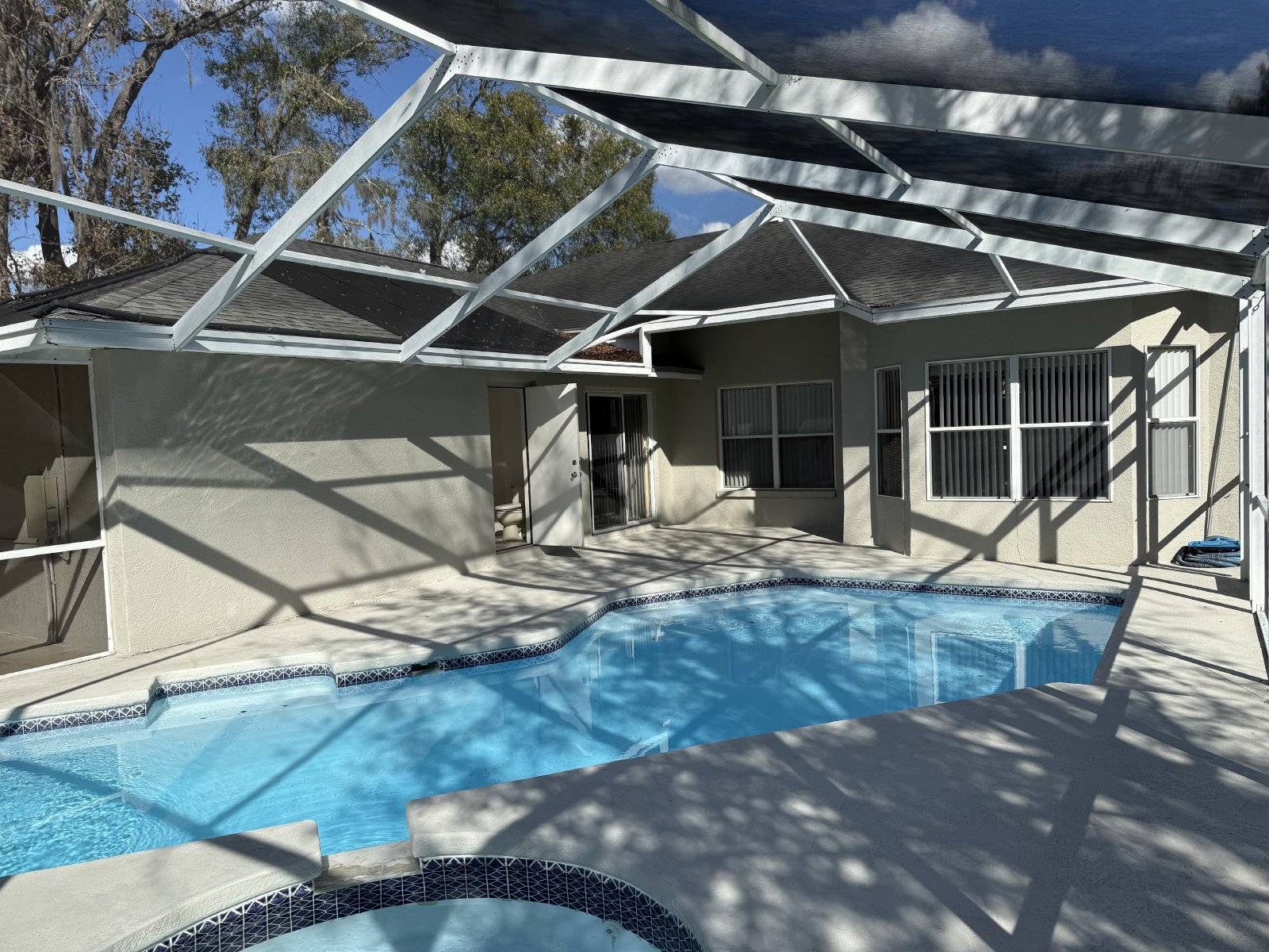 Gorgeous 4/2/2 Pool Home With Wood Floors On 1/2 Acre property image