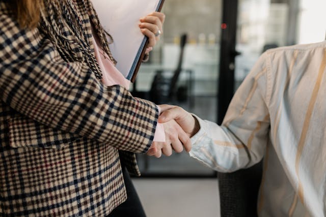 two people shaking hands